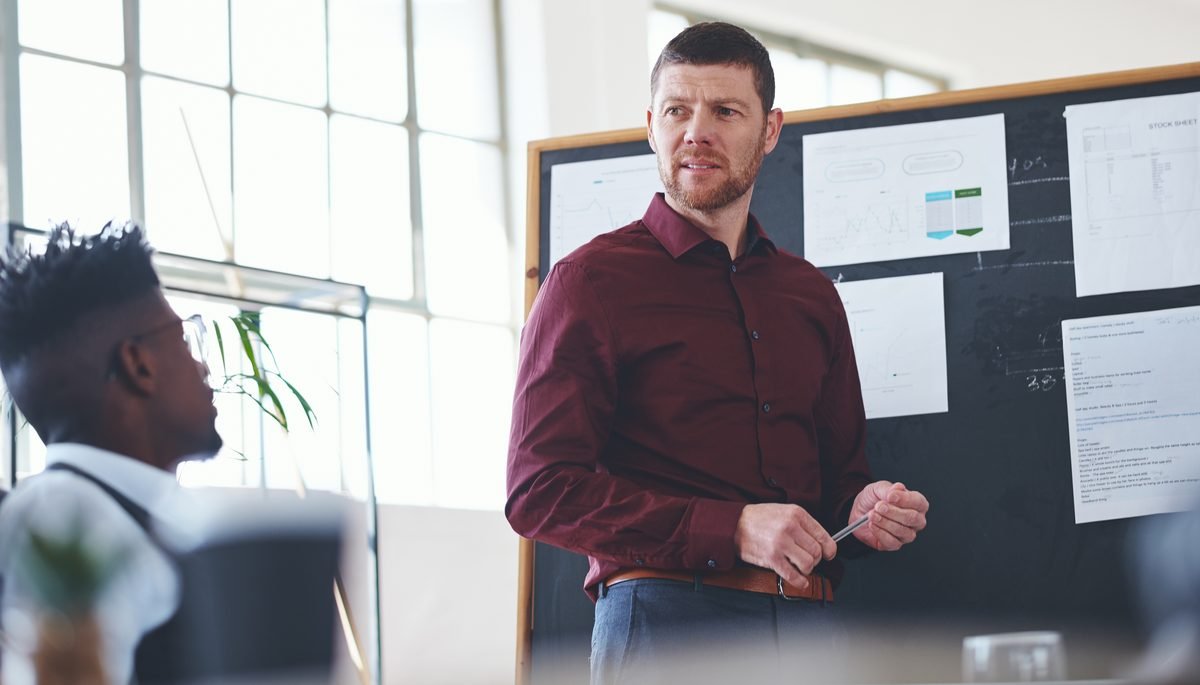A leader mid-conversation in a working session